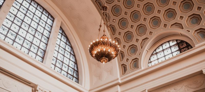 The Trust Performing Arts Center Great Hall ceiling and chandelier.