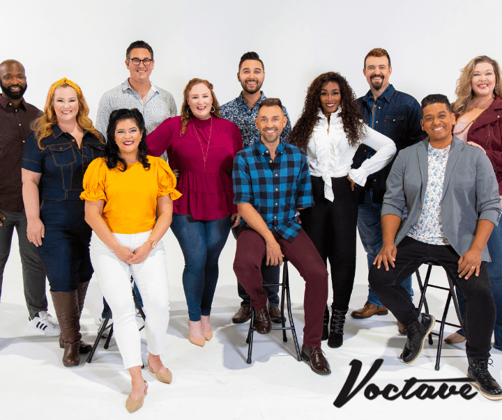 The members of Voctave smiling together.